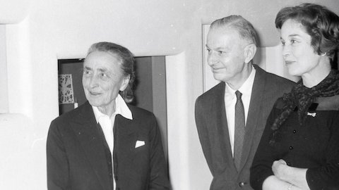 Alexander and Susan Girard standing next to Georgia O'Keeffe.