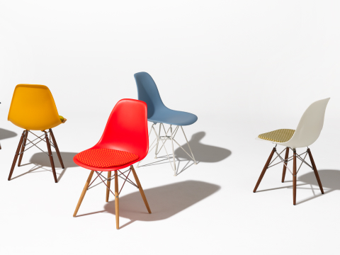 A selection of Eames Molded Shell Chairs in a variety of colors. A selection of Eames Molded Shell Chairs in a variety of colors.