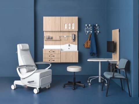 An exam room featuring a variety of products designed to foster meaningful conversation between patient and caregiver. An exam room featuring a variety of products designed to foster meaningful conversation between patient and caregiver.